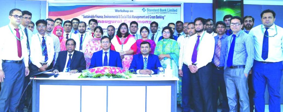 Md. Tariqul Azam, AMD of Standard Bank Limited,poses with the participants of a two-day long workshop on "Sustainable Finance, Environmental and Social Risk Management and Green Banking" for Credit Officers at its Training Institute in the city recently