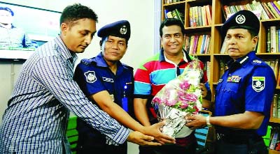 SAVAR: Additional DIG of Bangladesh Police Md Habibur Rahman BPM (Bar) PPM being greeted by police officers at Savar Media Club on his birthday recently .