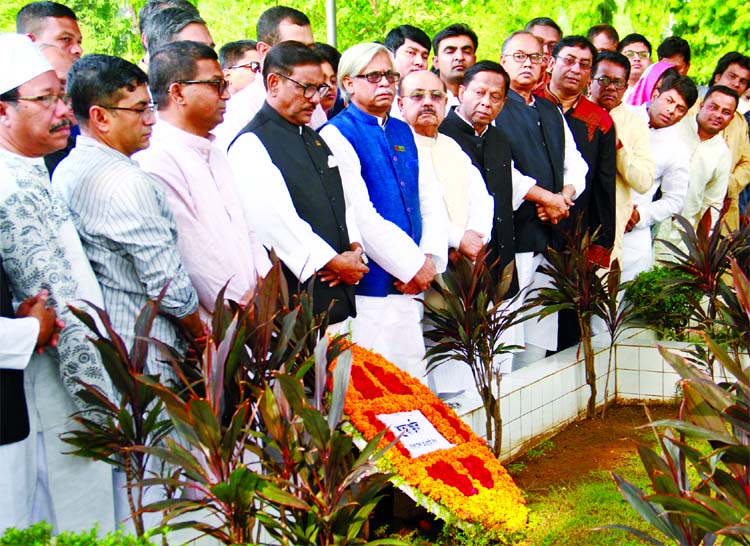 Road Transports and Bridges Minister Obaidul Quader, among others, stand in solemn silence after placing wreaths at the Mazar of Sher-e-Bangla AK Fazlul Huq in the city on Friday marking the latter's 56th death anniversary.