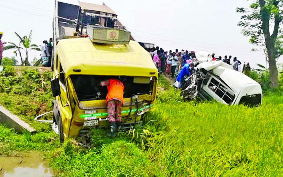 Two people were killed and three others injured in a head-on collision between an ambulance and a truck at Ghoga Battala on Dhaka-Bogura highway in Sherpur on Friday. Photo shows two vehicles skidded into the roadside ditch after accident.