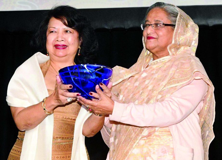 Prime Minister Sheikh Hasina receiving the prestigious Global Women's Leadership Award from GSW President Irene Natividad in Sydney on Friday.