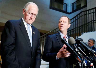 Rep. Mike Conaway, R-Texas, left, a member of the House Intelligence Committee, and Rep. Adam Schiff, D-Calif., ranking member of the House Intelligence Committee speak after closed meeting in Washington.