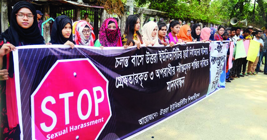 Students of the city's Uttara University formed a human chain in front of the Jatiya Press Club on Saturday demanding exemplary punishment to those involved in repression on a student of the university in running bus.