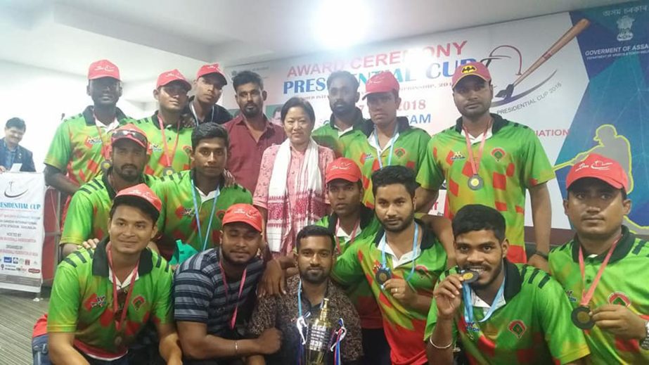 Members of Bangladesh Baseball team, which finish third in the ABFI Presidential Cup International Baseball Championship with the officials of ABFI pose for photo at the Indira Gandhi Athletic Stadium in Guwahati, Assam, India recently.