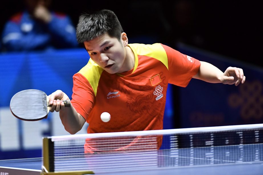 China's Fan Zhengdong returns to Russia's Sadi Ismalov in the Group B, Round 1 match between China and Russia, during the World Team Table Tennis Championships 2018 at Halmstad Arena in Halmstad, Sweden on Sunday.