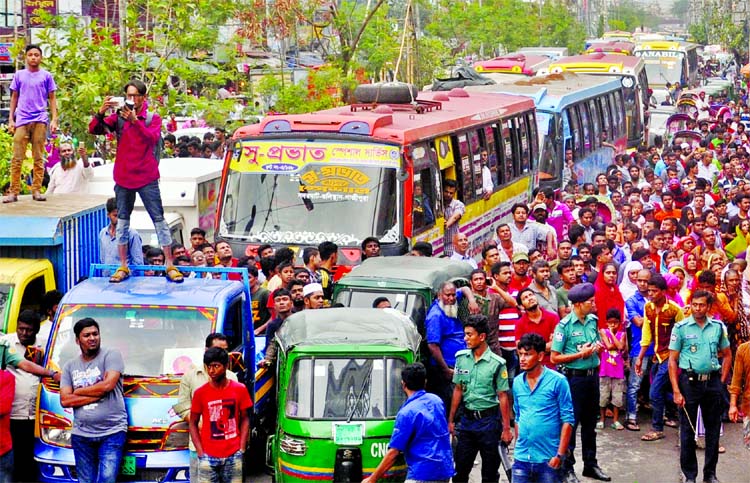 Hundreds of vehicles got stuck in a heavy traffic gridlock from Rampura to Malibagh Railgate in city as fire breaks out at a RMG factory at Hazipara area on Sunday.