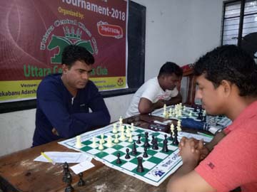 A scene from the First Holiday Open FIDE Standard Rating Chess Competition held at Maleka Banu Adarsha Bidyaniketon in Uttara on Sunday.