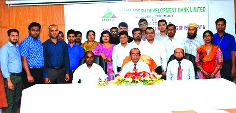 Manjur Ahmed, Managing Director of Bangladesh Development Bank Limited (BDBL), poses with the participants of a training course inauguration for 3 days on "Anti-Money Laundering and Combating Financing of Terrorism and Loan Classification" at its Karwan