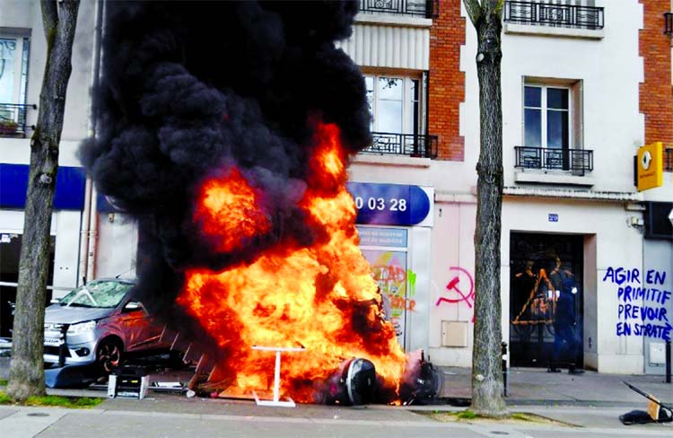 The anti-capitalist protesters torched a McDonald's restaurant and several cars.