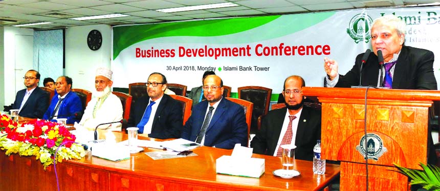 Professor Md. Nazmul Hassan, Chairman of Islami Bank Bangladesh Limited, addressing at `Business Development Conference' of its branches under four zones in Dhaka and 6 corporate branches at the banks head office in the city on Monday. Prof. Dr. Md. Sali