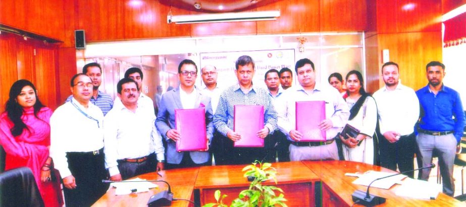 Sheikh Foyezul Amin, Joint Secretary on behalf of Power Division and Mina Masud Uzzaman, Secretary, Power Development Board of Bangladesh (PDB), poses for a photograph after signing a Power Purchase Agreement for 115MW electrification in Thakurgoan under