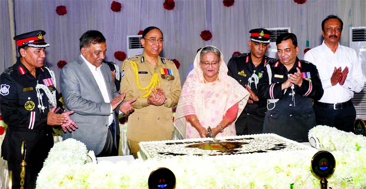 Prime Minister Sheikh Hasina inaugurating the 14th founding anniversary of RAB forces by cutting cake at its Headquarters in the city Kurmitola on Thursday.