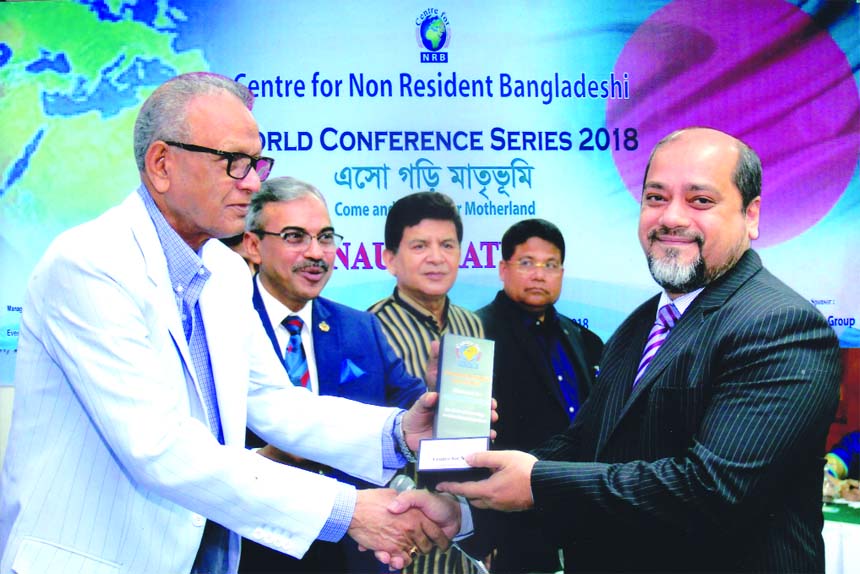 Mohammad Ali, DMD of Pubali Bank Limited, receiving the `Financial Branding Award 2018' for outstanding services and participation to increase the economic image of the country in abroad on behalf of the bank from Expatriates' Welfare and Overseas Emplo