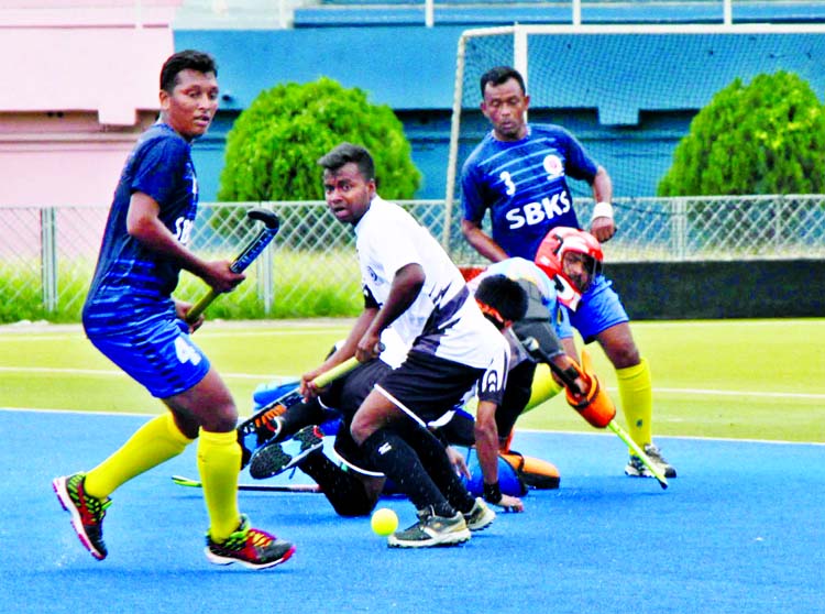 An action from the match of the Green Delta Insurance Premier Division Hockey League between Dhaka Mohammedan Sporting Club Limited and Sadharan Bima at the Maulana Bhashani National Hockey Stadium on Friday. Mohammedan beat Sadharan Bima by 7-2 goals.