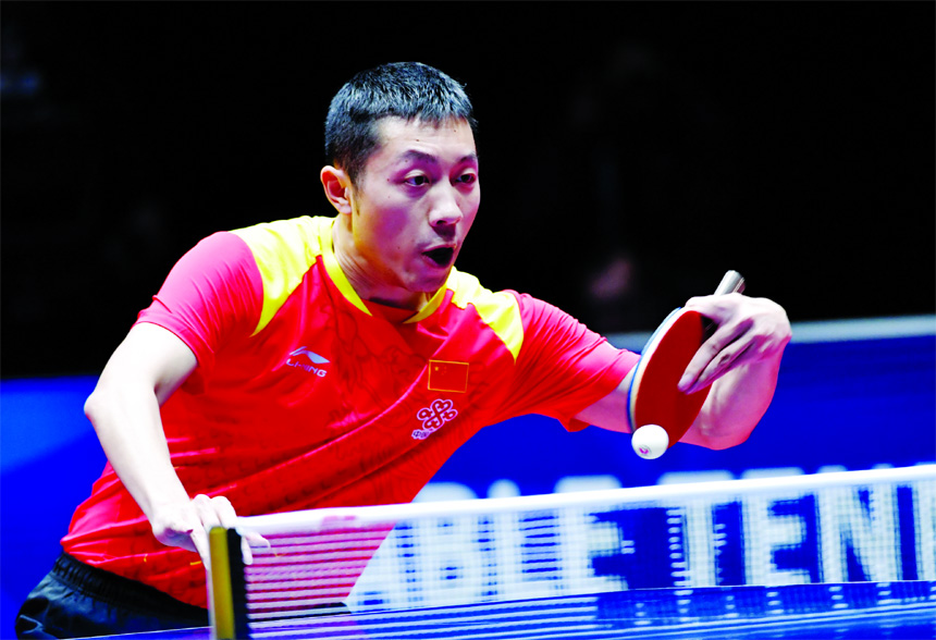 Xu Xin of China plays against Jon Persson of Sweden during the men's semifinal at the World Team Table Tennis Championships in Halmstad, Sweden on Saturday.