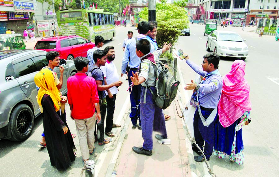 Scout members on Saturday joined the campaign to create awareness among the people about the danger of crossing the road divider instead of using nearby foot over bridge.