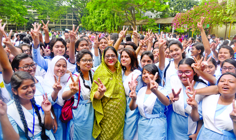 Students of Viqarunnisa Noon School and College rejoicing their victory in SSC examinations on Sunday.