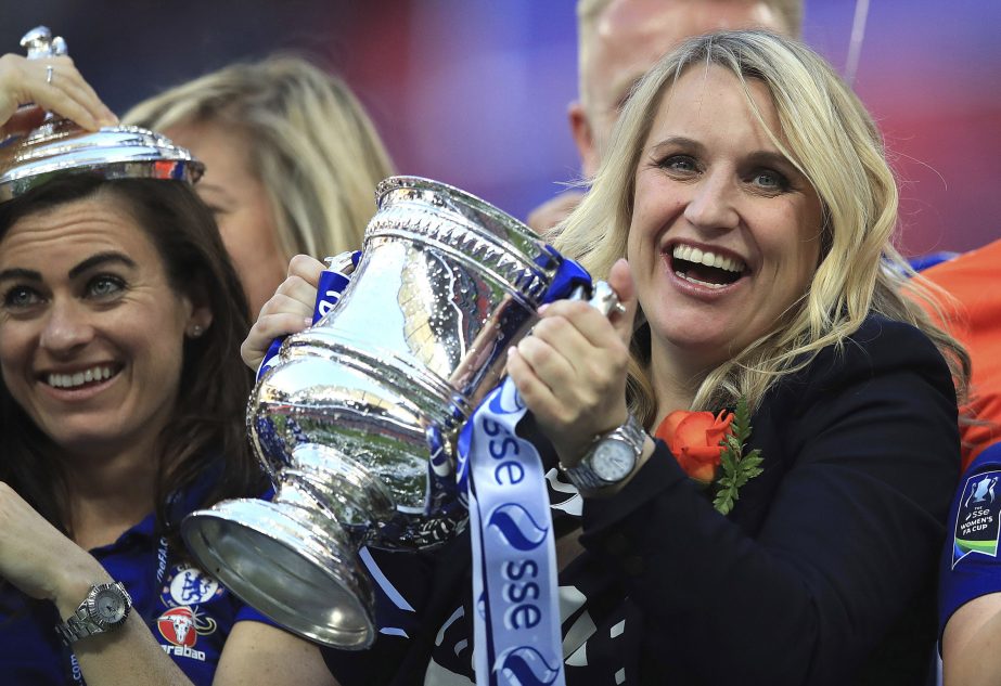 Chelsea Ladies manager Emma Hayes (right) celebrates with the trophy after the final whistle after beating Arsenal Women's team during the Women's FA Cup final at Wembley Stadium in London on Saturday.