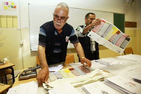 Lebanese officials count votes at a polling centre in Beirut after the country's first parliamentary elections in nine years