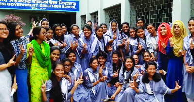FENI: Students of Feni Government Girls' High School showing V-sign after their successful SSC result on Sunday.