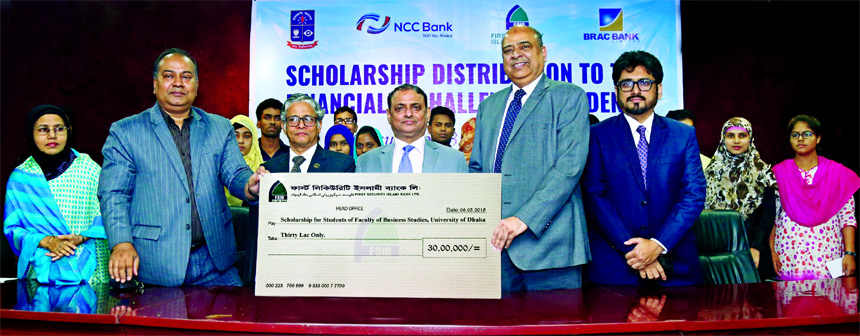 Syed Waseque Md Ali, Managing Director of First Security Islami Bank Limited, handing over a cheque of Tk 30 lakh to Prof Dr Akhtaruzzaman, Vice-Chancellor of Dhaka University as scholarship to meritorious and financial challenged students of Faculty of B