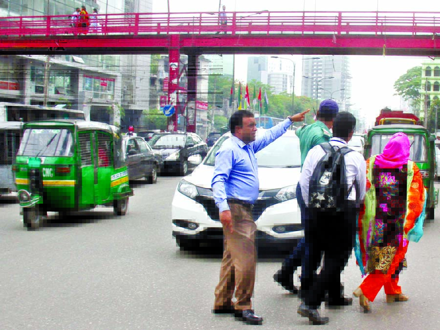 A mobile court was set up jointly by DMP and BSTI in front of Bangla Motor Foot-over Bridge in the city on Monday with a view to raising awareness among people for using foot-over bridge.