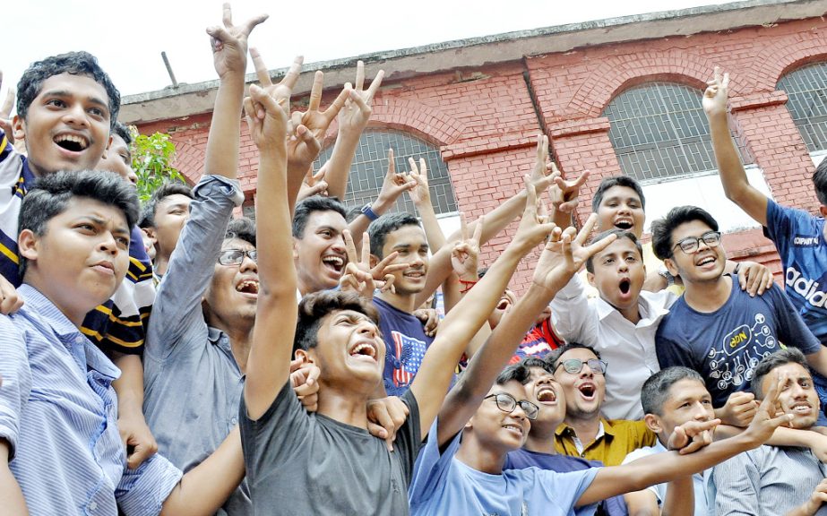 Students of Chattogram Collegiate School which obtained first position rejoicing their successful SSC result on Sunday.