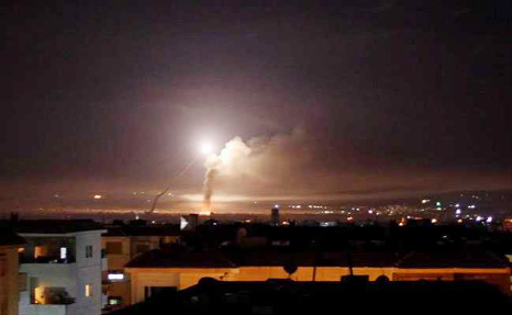 Missile fire is seen from Damascus, Syria on Thursday.