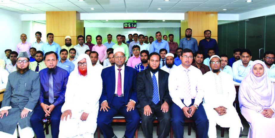 Md. Habibur Rahman, Managing Director of Al-Arafah Islami bank Limited, poses for a photograph with the participants of day-long training on "Shariah Implementation in AIBL' at the banks Training and Research Institute in the city recently. Mufti Sayed