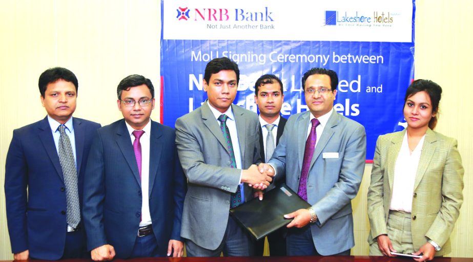 Mir Shafiqul Islam, Head of Cards of NRB Bank Limited and Saiful Islam Saif, Manager Event and Catering Sale of Lakeshore Hotel, Gulshan, exchanging an agreement signing documents at the bank's head office in the recently. Under the deal, Credit Cardhold