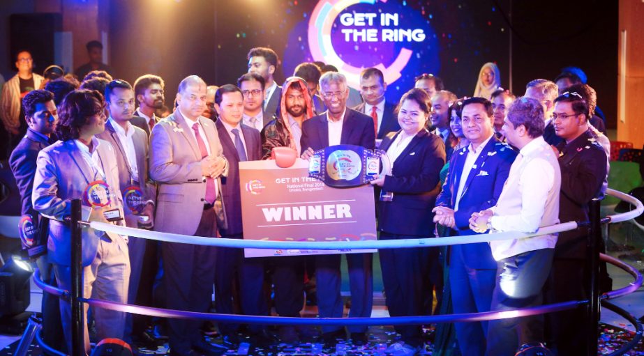 Dr Md. Sabur Khan, Chairman, Board of Trustees of Daffodil International University hands over the champion award of National Final of 'Get in the Ring -2018, Bangladesh' to Nusrat Jahan Rysa of Arced Foundation in a ceremony held at the University camp