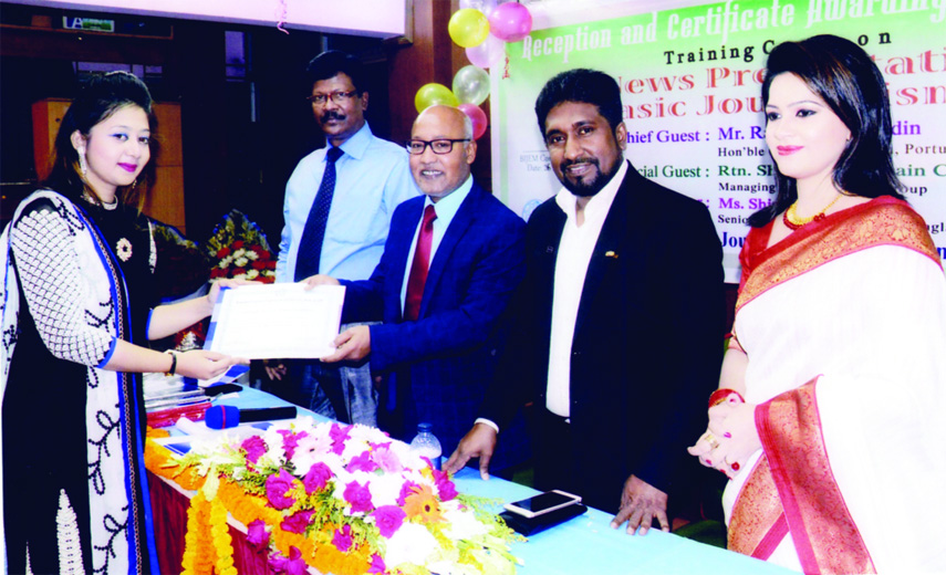 Rana Taslim Uddin, Councillor, Lisbon, Portugal distributing certificates among the participants at the certificate awarding ceremony of two training courses titled 'Basic Journalism' and 'TV News Presentation' organised by Bangladesh Institute of Jou