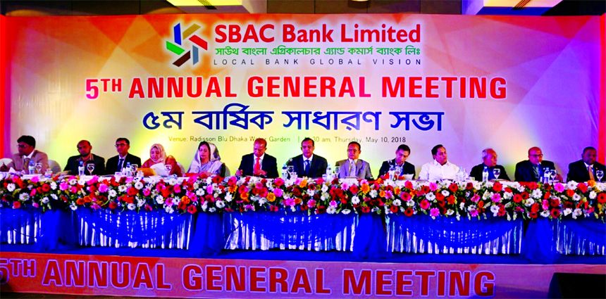 SM Amzad Hossain, Chairman of South Bangla Agriculture and Commerce (SBAC) Bank Limited, presiding over its 5th AGM at a hotel in the city on Thursday. The AGM approves 13.50 per cent stock dividend for the year 2017 for its shareholders. Md. Golam Faruqu