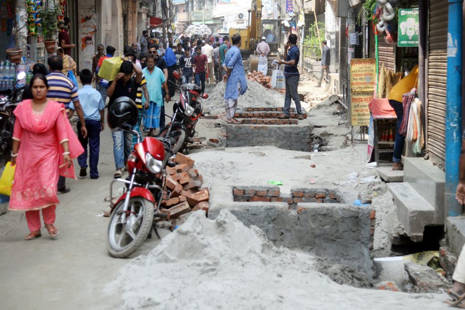 Pedestrians and also passengers facing acute problem due to road digging for the utility services. The snap was taken from the city's Nazimuddin Road on Saturday.