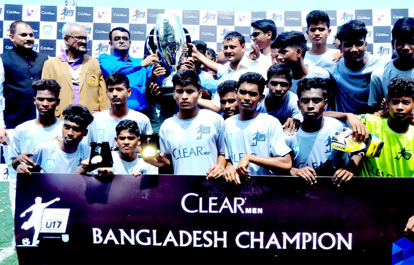 Members of Sonadighi High School, the champions of the Clear Men Under-17 Football Championship with the guests and officials of Bangladesh Football Federation pose for a photo session at the Shaheed Sepoy Mohammad Mostafa Kamal Stadium in the city's Kam
