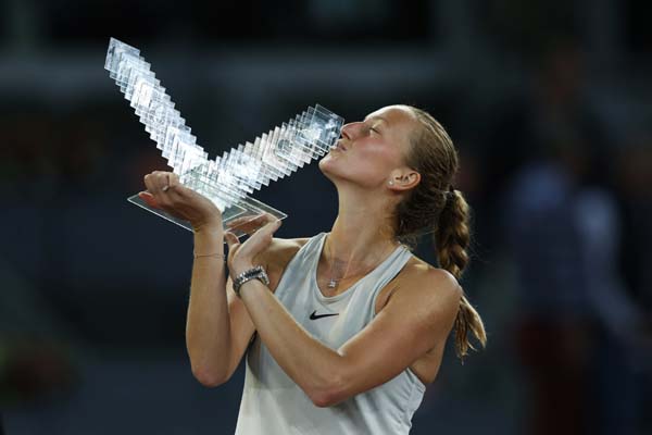 Czech Republic's Petra Kvitova kisses her trophy after winning against The Netherlands' Kiki Bertens in the Madrid Open tennis tournament final match in Madrid, Spain on Saturday.