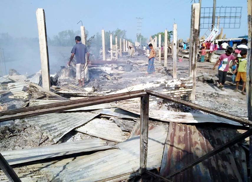 A devastating fire gutted shops at Badarkhali Bazar in Chakoria Upazila on Saturday.