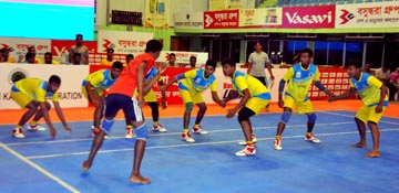 A moment of the match of the Bashundhara Group IGP Cup National Youth Kabaddi Championship between Cumilla District team and Gopalganj District team at the Shaheed Tajuddin Ahmed Indoor Stadium on Sunday.