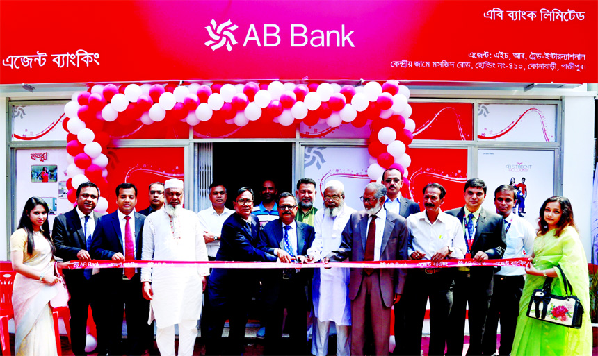 Sajjad Hussain, DMD of AB Bank Limited, inaugurating its 3rd Agent Banking point at Kona Bari in Gazipur recently. Krishibid Md. Faruk-Ul-Islam, President of BSCIC Industry, local elites and senior executives of the bank were also present.