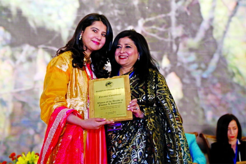 Chartered Insurer Farzana Chowdhury ACII (UK), Managing Director and CEO of Green Delta Insurance receiving the WEF Award on "Woman of the Decade in Finance and Insurance". She was awarded in a session titled 'In Conversation with Leaders of the Decade