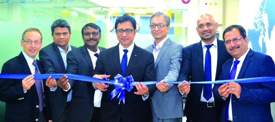 Nironjon Nadkaroni, CEO of South and South-East Asia, Middle-East and Africa Region of TÃœV SÃœD, inaugurating its 2nd Training centre as Pearson Test of English (PTE) at city's Dhanmondi area recently. High officials of TÃœV SÃœD Bangladesh (Pvt