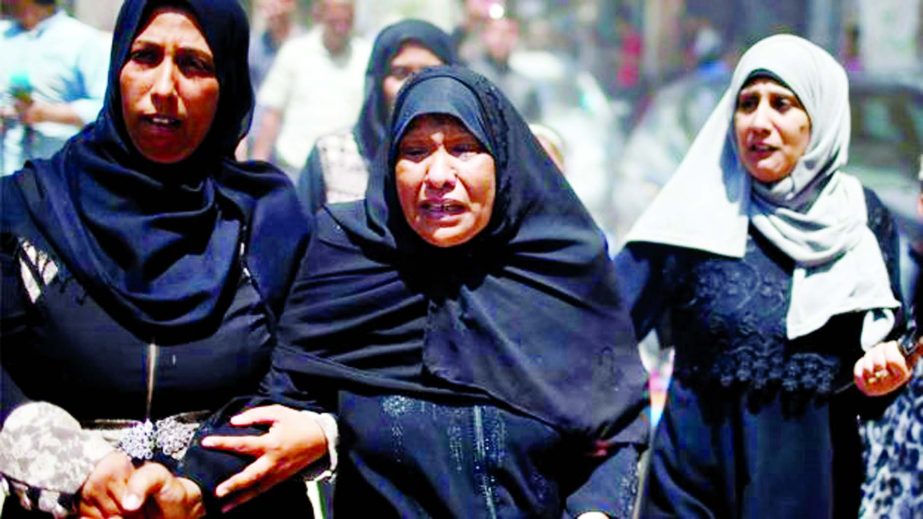 Relatives mourn at a funeral in Gaza on Tuesday.