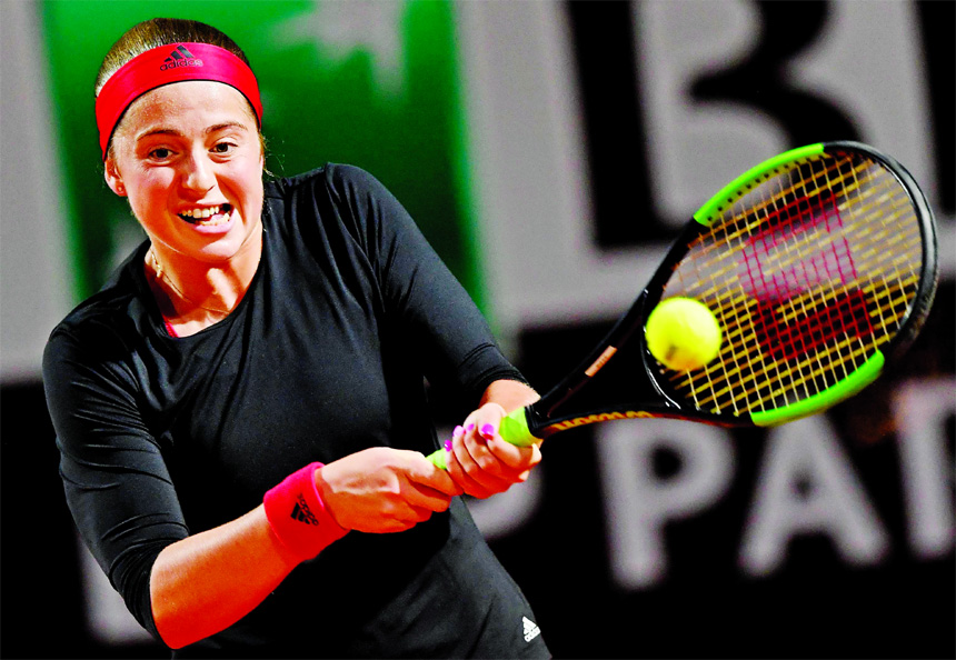 Jelena Ostapenko of Latvia returns the ball to Shuai Zhang of China during the Italian Open tennis tournament in Rome on Tuesday.