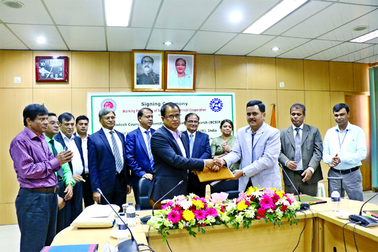 Participants in an agreement signing ceremony between Bangladesh Council of Scientific and Industrial Research (BCSIR) and Council of Scientific & Industrial Research (CSIR), India in the conference room of BCSIR in the city on Tuesday.