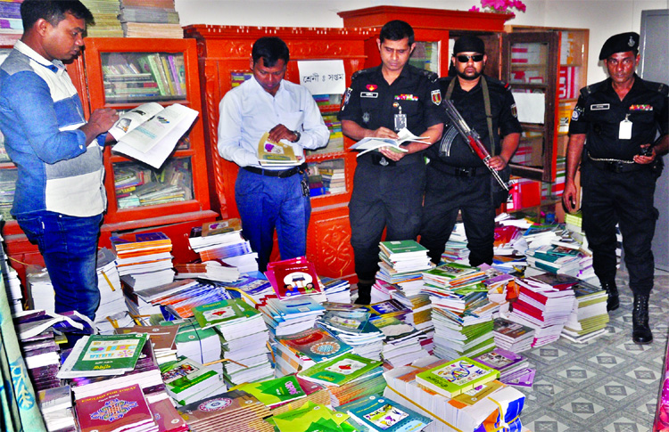 RAB mobile team cordoned off a godown and recovered 3500 text books, stockpiled by the Goran Adarsa School authorities. Headmaster of the school was sent to jail for three months on Wednesday.