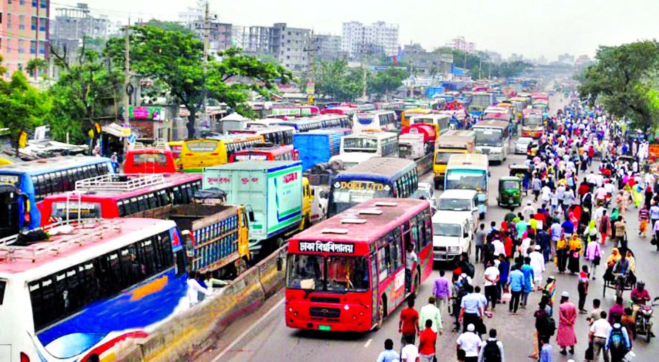 Thousands of vehicles remain stuck in a traffic gridlock on both sides of Dhaka-Chattogram Highway stretching from city's Rayerbagh to Cumilla, causing untold sufferings to commuters for hours. Many passengers got down from their respective vehicles and