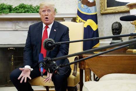 President Donald Trump speaks during a meeting with NATO Secretary General Jens Stoltenberg (Not seen) in the Oval Office of the White House on Thursday in Washington