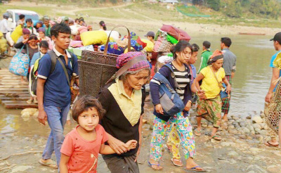 Civilians in Kachin State, Burma, fleeing fighting in the Injangyang area.