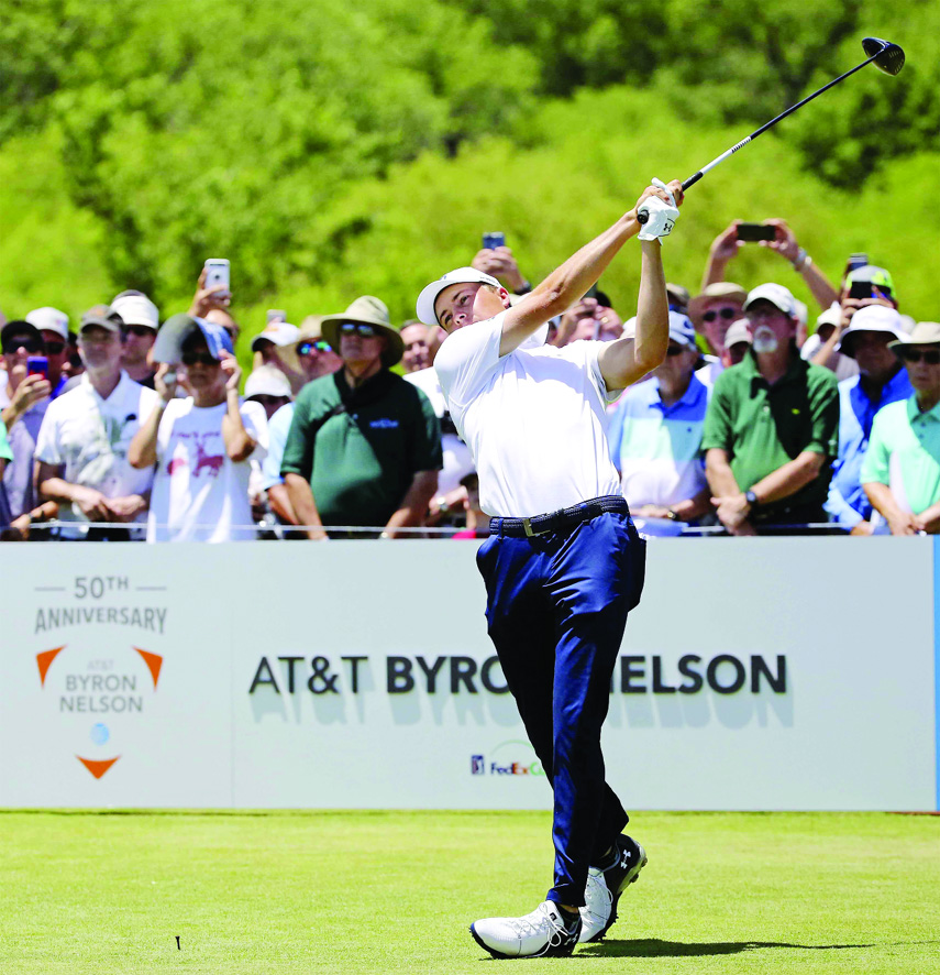 Jordan Spieth hits his tee shot on the first hole during the first round of the AT&T Byron Nelson golf tournament at Trinity Forest in Dallas on Thursday.