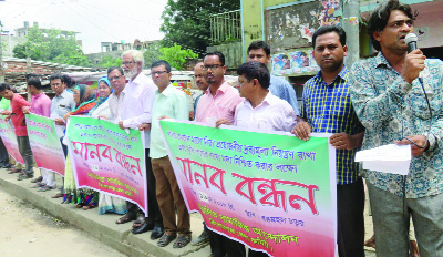 KISHOREGANJ: Sammilito Samajik Andolon, Kishoreganj District Unit formed a human chain at Station Road protesting price- hike of essentials yesterday.